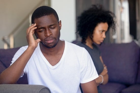 man and woman upset and not talking to each other